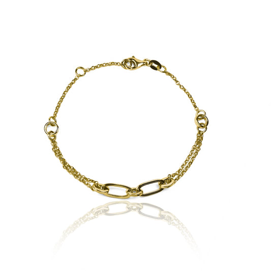 Pulsera cubana + clips + cicles elaborada en oro de 18K por Joyería Caracas. Con garantía de por vida.