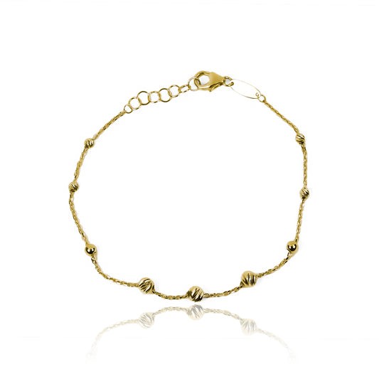 Pulsera faceted spheres elaborada en oro 18K por Joyería Caracas, cuenta con un certificado de calidad y garantía de por vida.