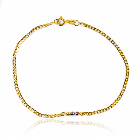 Tobillera cubana + esferas 3 oros #3 de Joyería Caracas. Hecha de oro 18K y con garantía de por vida.