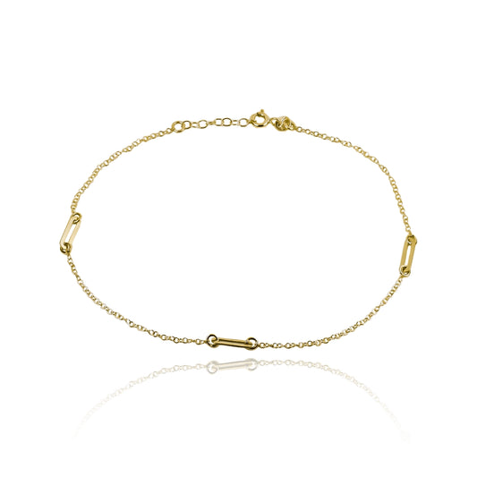 Tobillera clics elaborada en oro 18K por Joyería Caracas. Además, ofrece garantía para toda la vida.