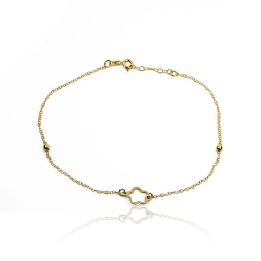 Tobillera flower y esferas elaborada en Oro 18K por Joyería Caracas, cuenta con un certificado de calidad y garantía de por vida.