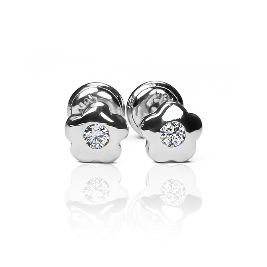 Topitos Diamond flower JC, fabricados en Oro 18K y diseñado por Joyería Caracas, cuenta con una garantía para toda la vida.