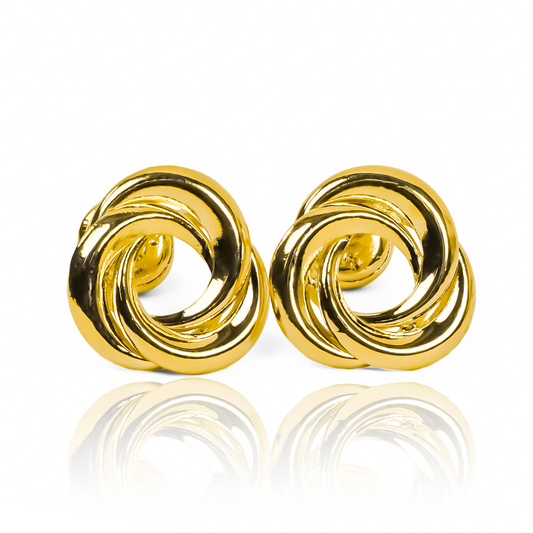 Los Topitos Espiral en oro 18K de Joyería Caracas son una verdadera obra de arte. Su diseño en espiral es una expresión de elegancia y exclusividad. Además, con la garantía para toda la vida, podrás disfrutar de estas piezas únicas por siempre.
