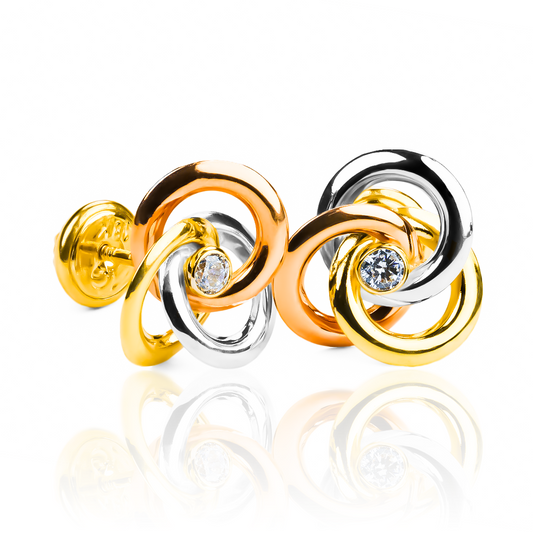 Topitos Espiral 3 Oros centro cristal fabricados en Oro 18K por Joyería Caracas. Con garantía para toda la vida.