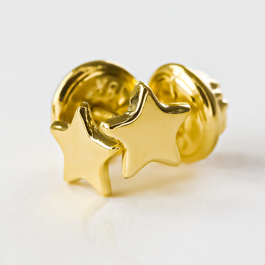 Topitos Estrellas L JT, elaborada en Oro 18K por Joyería Caracas. Con garantía de por vida.