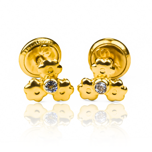 Topitos Flor de loto mecánica en oro 18K, diseñado por Joyería Caracas. Esta pieza única conlleva una garantía de por vida, para asegurar su calidad y durabilidad. Disfruta de la belleza y la artesanía de este collar en tu colección de joyas.