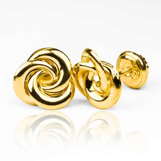 Topitos Flor espiral soplada M en oro 18K de Joyería Caracas brinda una elegancia eterna. Con garantía para toda la vida, su belleza espiral inspira fluidez y gracia.