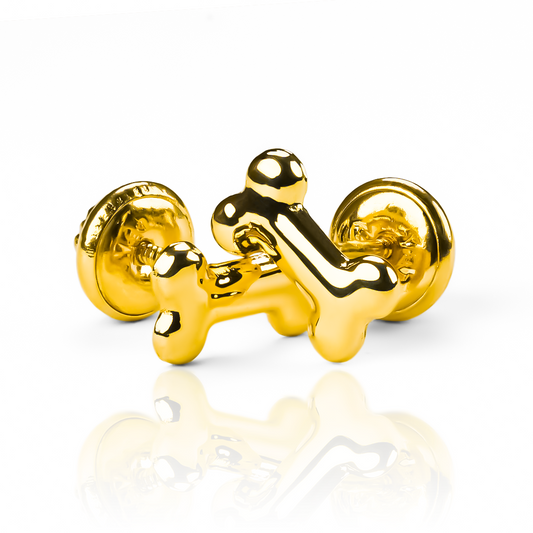 Topitos Huesitos fabricados en oro 18K por Joyería Caracas. Además, cuentan con una garantía para toda la vida.