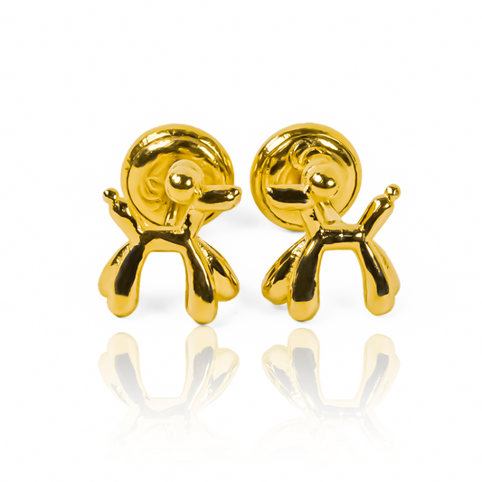 Disfruta de lujo y elegancia con los Topitos Perritos, confeccionados en Oro 18K y diseñados por Joyería Caracas. La garantía de por vida te asegura que tendrás estos topitos como una pieza exclusiva para siempre.