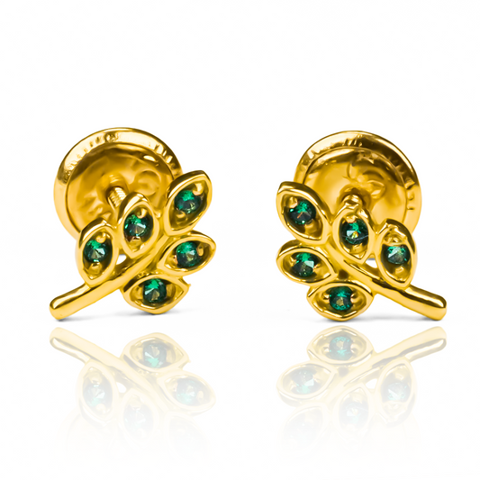Topitos Racimo verde. Con su diseño en oro 18K, esta joyería de Caracas se asegura de ofrecer una garantía para toda la vida. Disfrute de un estilo sofisticado y distinguido con este producto único.