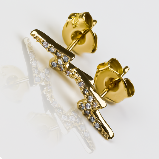 Topitos Rayo cristales fabricados en Oro 18K por Joyería Caracas, cuenta con garantía de por vida.