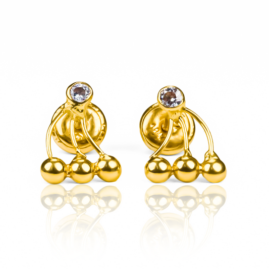 Descubre la elegancia y exclusividad del Topitos Trípode. Fabricado con oro 18K y con la garantía de Joyería Caracas para toda la vida. Así, podrás lucir este increíble accesorio en cualquier ocasión con la confianza de tener una pieza de lujo que perdurará por siempre.