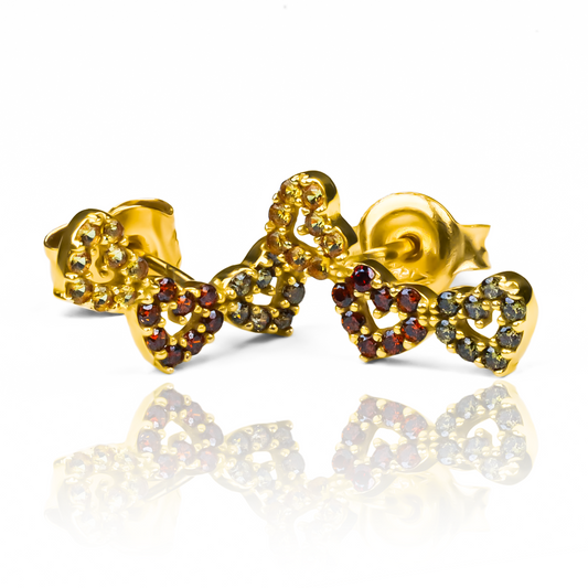 Topitos Trik x Heart I combina el brillo del oro 18K con la elegancia de Joyería Caracas. Con su diseño exclusivo, es garantía para toda la vida de una pieza de lujo que nunca pasará de moda. Haz una declaración de estilo con Topitos Trik x Heart I.