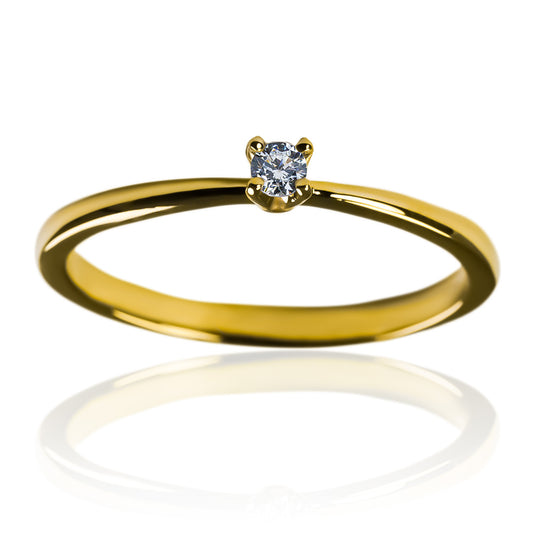 Anillo de compromiso Ámsterdam Diamond de Joyería Caracas. Fabricado en oro de 18k, este anillo lleva incrustado un diamante de la más alta calidad. Además, ofrecemos garantía de por vida.