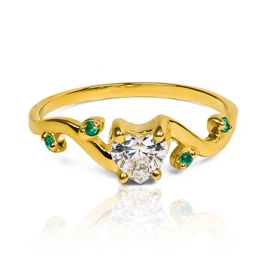 Anillo de compromiso corazón espinado- Diamante y Esmeraldas de Joyería Caracas y la belleza del oro 18k, cuenta con garantía de por vida.