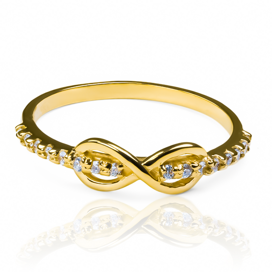Anillo crossing infinity de Joyería Caracas, hecho de oro 18k y garantizado por toda la vida.