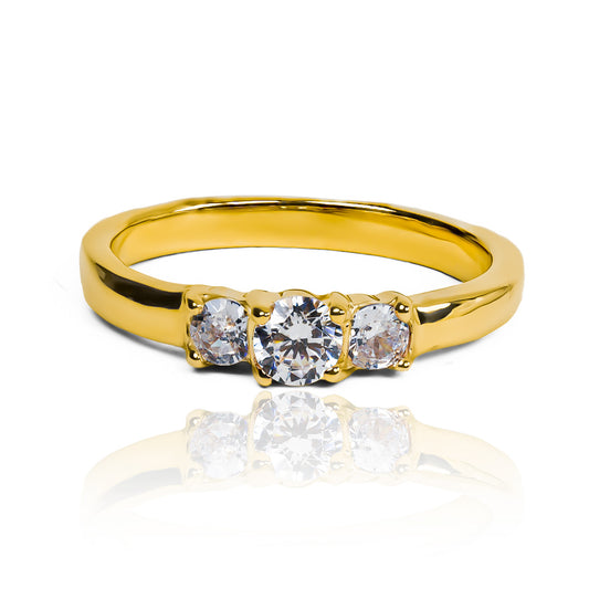 Anillo de compromiso con 3 piedras es el símbolo perfecto de tu amor eterno. Hecho con oro de 18 k y elaborado en Joyería Caracas, cuenta con garantía de por vida.
