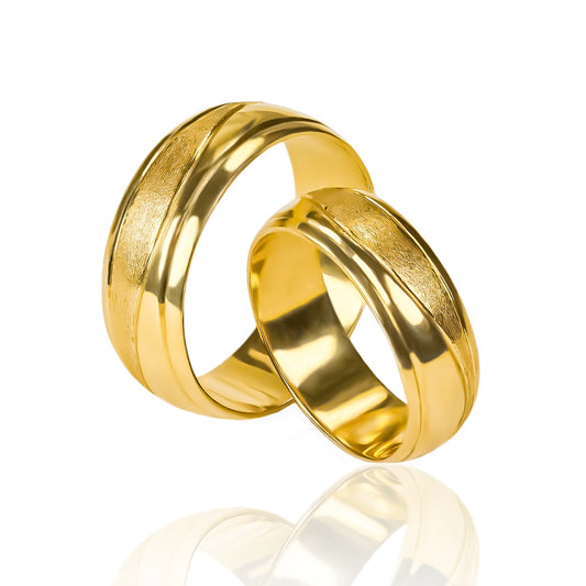 Argollas de matrimonio Atlantis Mitad Mate + Bisel, elaboradas en oro 18k por Joyería Caracas, cuenta con certificado de calidad y garantía de por vida.