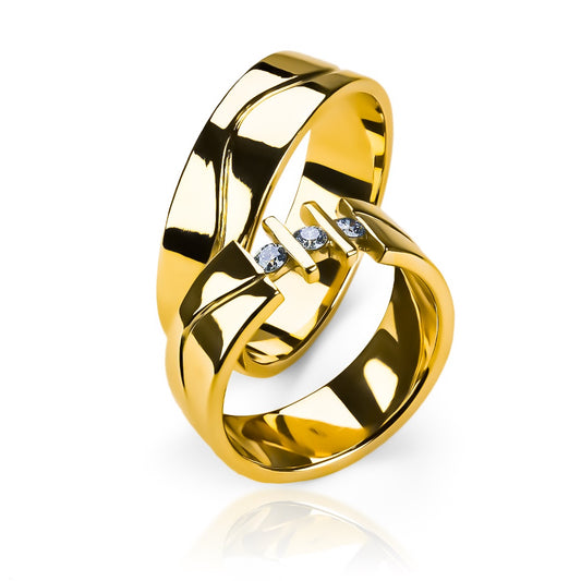 Argollas de matrimonio between waves fabricadas en oro 18k de Joyería Caracas, cuentan con certificado de calidad y garantía para toda la vida.