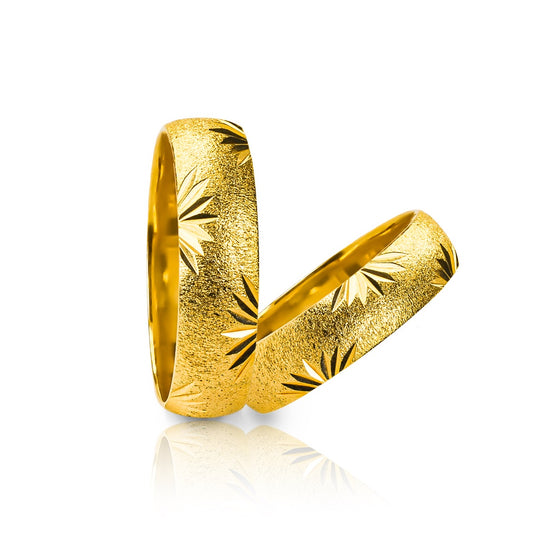 Argollas de matrimonio Bouquet, elaboradas en oro 18k por Joyería Caracas, cada una viene con un certificado de calidad y garantía para toda la vida.