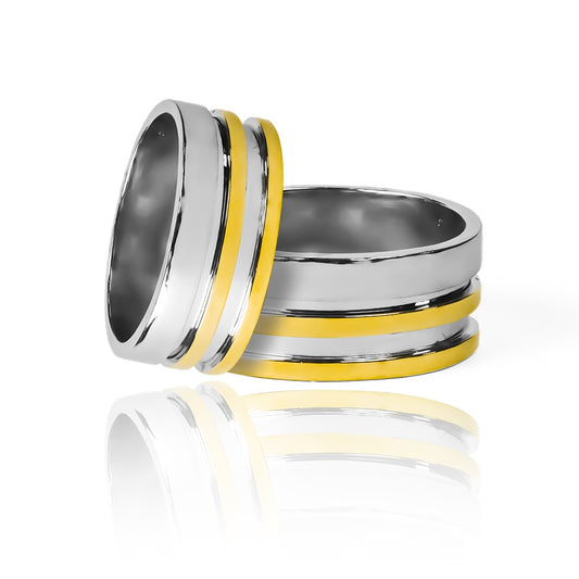 Argollas de matrimonio canal duo bicolor de Joyería Caracas, fabricadas en oro 18k de la mejor calidad. Incluyen certificado de garantía.