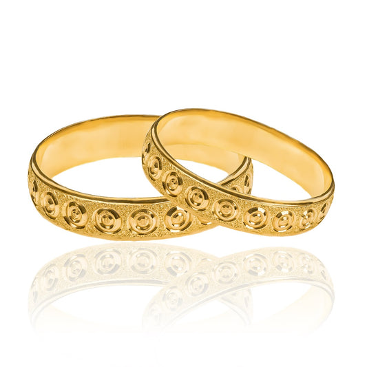 Argollas de matrimonio Cirkú, elaboradas en oro 18k por Joyería Caracas, cada argolla viene acompañada de un certificado de calidad y garantía para toda la vida.