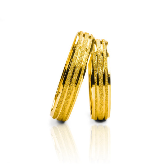 Argollas de matrimonio Classic & Elegance, elaboradas en oro 18k por Joyería Caracas, cuentan con certificado de calidad y garantía de por vida.