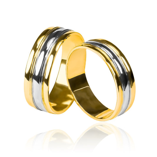 Argollas de matrimonio Concave Buríl, elaboradas en oro de 18k por Joyería Caracas, cada una cuenta con certificado de calidad y garantía de por vida.