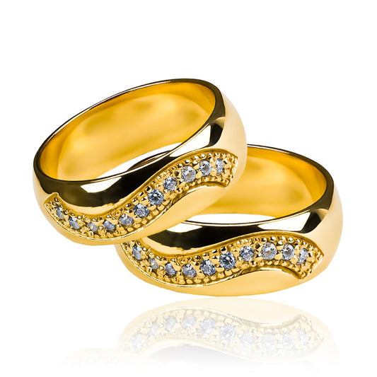 Argollas de matrimonio Curve Love, elaboradas en oro 18k por Joyería Caracas, cada una cuenta con un certificado de calidad y garantía de por vida.