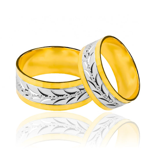 Argollas de matrimonio Espiga Torcida Bicolor XL, fabricadas en oro 18 quilates, cuentan con un certificado de calidad y garantía de por vida que garantiza su valor y durabilidad.