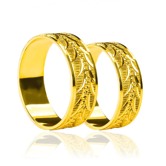 Argollas de matrimonio Espiga Torcida Fondo Rayado, elaboradas en oro 18 quilates, cuentan con un certificado de calidad y garantía de por vida.