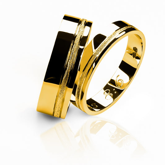 Argollas de matrimonio exhotic twist, fabricadas en oro de 18k de Joyería Caracas, cuentan con certificados de autenticidad y garantía de por vida.