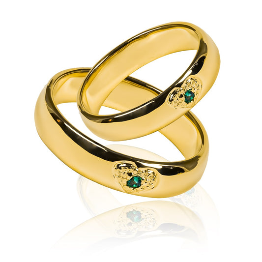 Argollas de matrimonio Green Heart de Joyería Caracas fabricados en oro 18 quilates, cada argolla viene con un certificado de calidad y garantía para toda la vida.