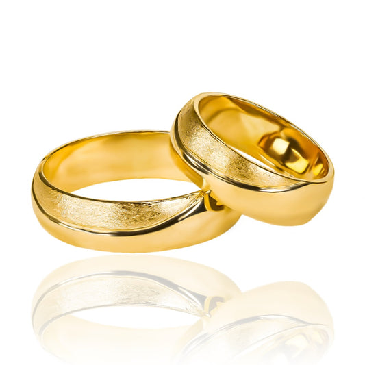 Argollas de matrimonio Hanna, fabricado en oro 18 quilates por Joyería Caracas. Cada uno viene con un certificado de calidad y garantía para toda la vida.