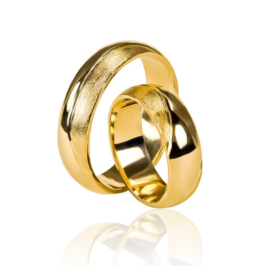 Argollas de matrimonio Hanna, fabricado en oro 18 quilates por Joyería Caracas. Cada uno viene con un certificado de calidad y garantía para toda la vida.