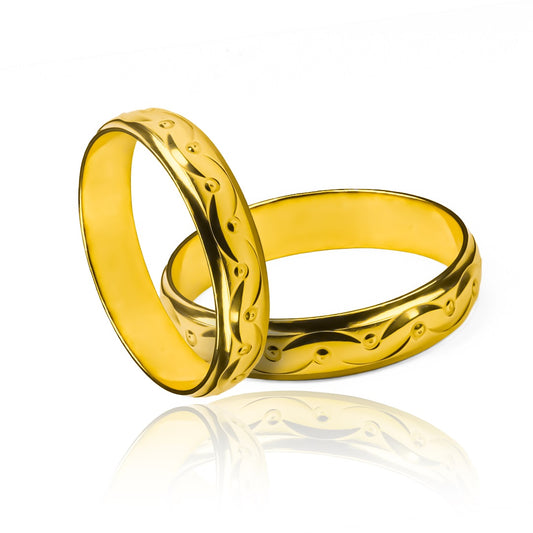 Argollas de matrimonio Happy Love, elaboradas en oro 18k por Joyería Caracas, cada una cuenta con un certificado de calidad y garantía de por vida.