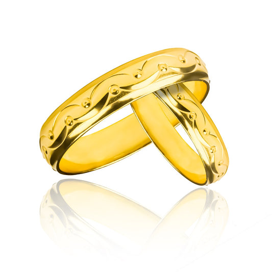 Argollas de matrimonio Happy Love, elaboradas en oro 18k por Joyería Caracas, cada una cuenta con un certificado de calidad y garantía de por vida.