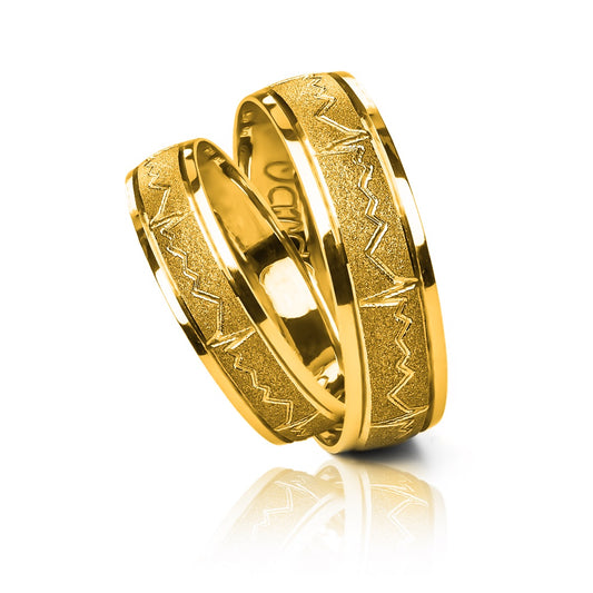 Argollas de matrimonio Heart Rate, elaboradas en oro 18k por Joyería Caracas, cada argolla viene con un certificado de calidad y garantía de por vida.