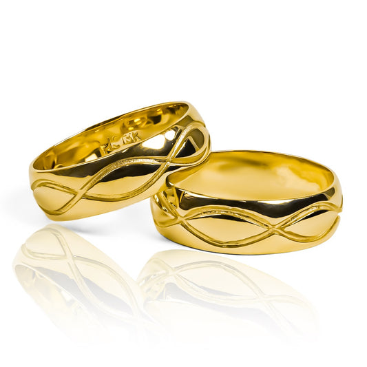 Argollas de matrimonio Infinite, fabricadas en oro de 18k por Joyería Caracas, cada argolla viene con un certificado de calidad y garantía para toda la vida.