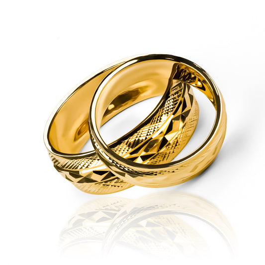Argollas de matrimonio Joker, elaboradas en oro 18k por Joyería Caracas, cuentan con un certificado de calidad y garantía para toda la vida.