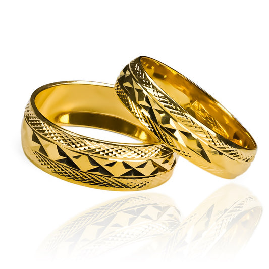 Argollas de matrimonio Joker L, elaboradas en oro 18k, cada argolla viene con un certificado de calidad y garantía para toda la vida.