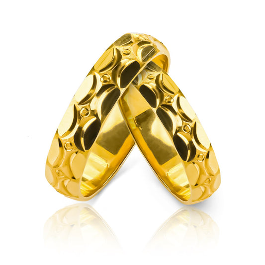 Argollas de matrimonio Jumper Lover en oro 18k por Joyería Caracas, cada una viene con un certificado de calidad y garantía de por vida.