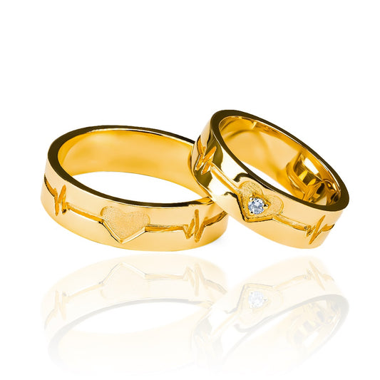 Argollas de matrimonio Latidos de Corazón 3D, fabricados en oro de 18k de Joyería Caracas, Cada argolla viene con un certificado de autenticidad y garantía de por vida.