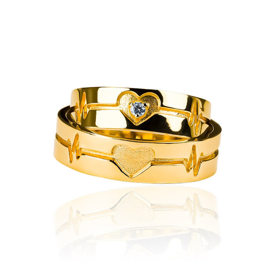 Argollas de matrimonio Latidos de Corazón 3D, fabricados en oro de 18k de Joyería Caracas, Cada argolla viene con un certificado de autenticidad y garantía de por vida.