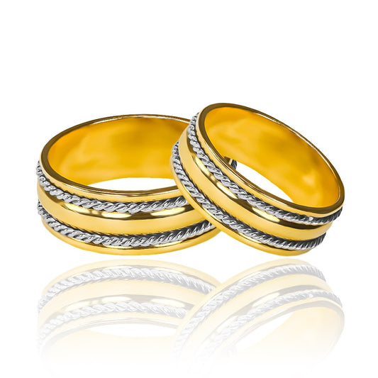 Argollas de matrimonio Lazo de Amor Bicolor, elaboradas en oro 18k de Joyería Caracas. Cada argolla viene acompañada de un certificado de autenticidad y garantía para toda la vida.