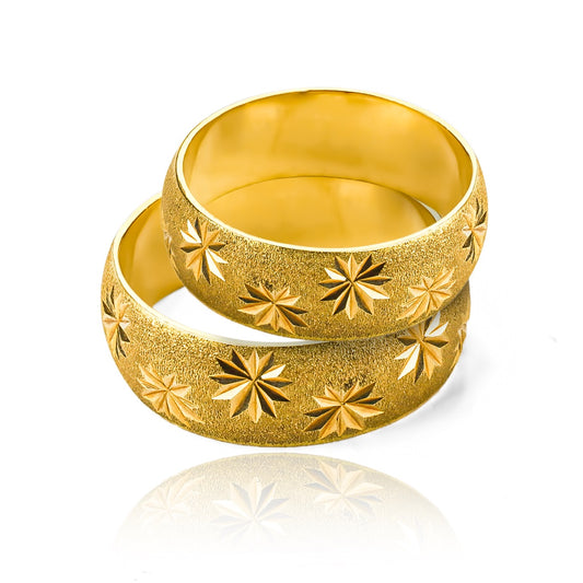 Argollas de matrimonio Noche Estrellada, fabricadas en oro 18 quilates, cuentan con certificado de calidad y garantía para toda la vida.