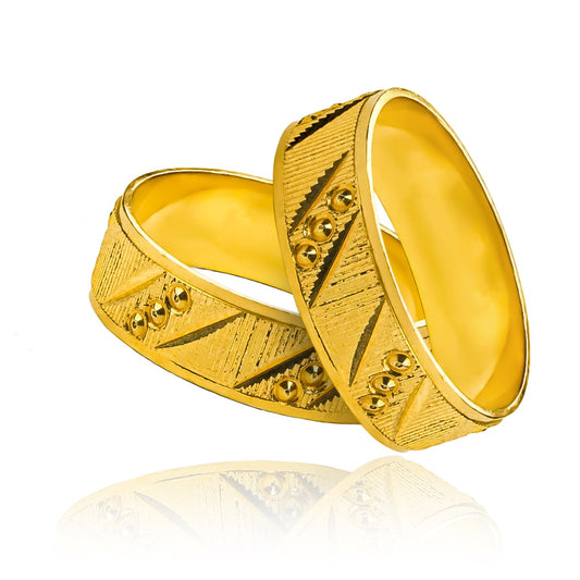 Argollas de matrimonio Pasión, elaboradas en oro 18k por Joyería Caracas, cuenta con certificado de calidad y garantía de por vida.