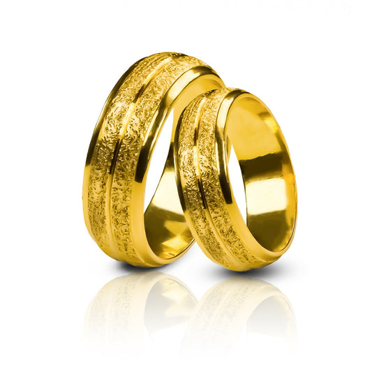 Argollas de matrimonio Sandwheel, diseñadas y elaboradas en oro 18 quilates por Joyería Caracas, cuentan con un certificado de calidad y garantía de por vida.