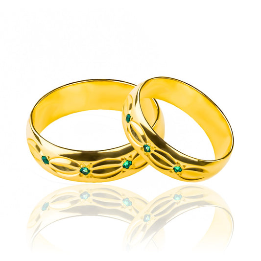 Argollas de matrimonio Sheet Green Cristal, elaboradas en oro 18k por Joyería Caracas, cada argolla viene con un certificado de calidad y garantía de por vida.