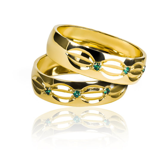 Argollas de matrimonio Sheet Green cristal Concava de Joyería Caracas. Fabricadas en oro de 18k certificado, cuentan con garantía para toda la vida.